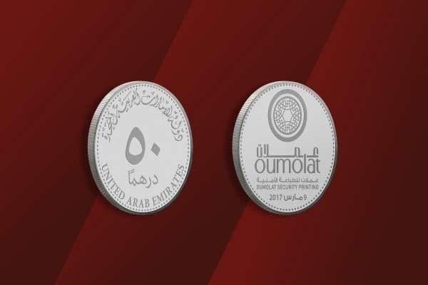 Moneda conmemorativa de la apertura de Oumolat Security Printing.