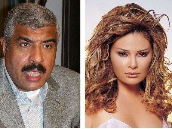 El empresario egipcio y la estrella del pop libanesa. (AFP)