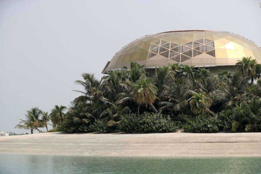Playa del palacio en la Isla de Suecia en Las Islas del Mundo de Dubai.