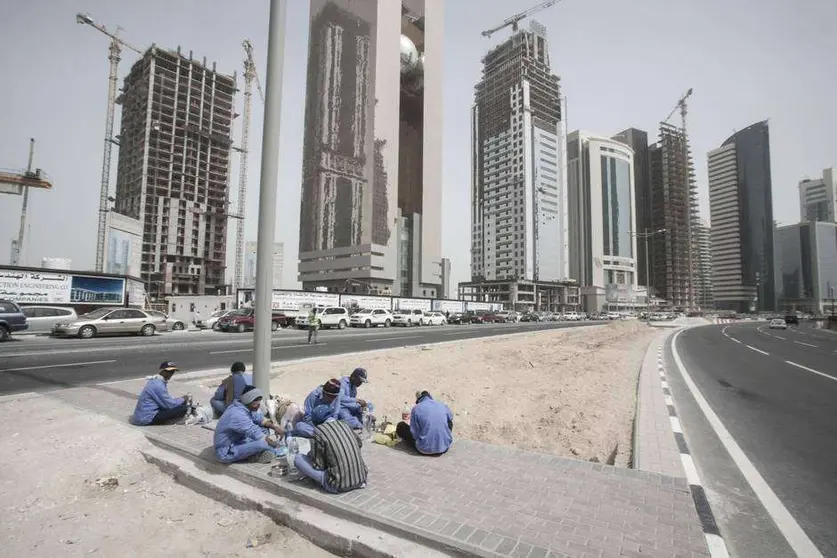 Un grupo e rabajadores de la construcción haciendo un descanso.