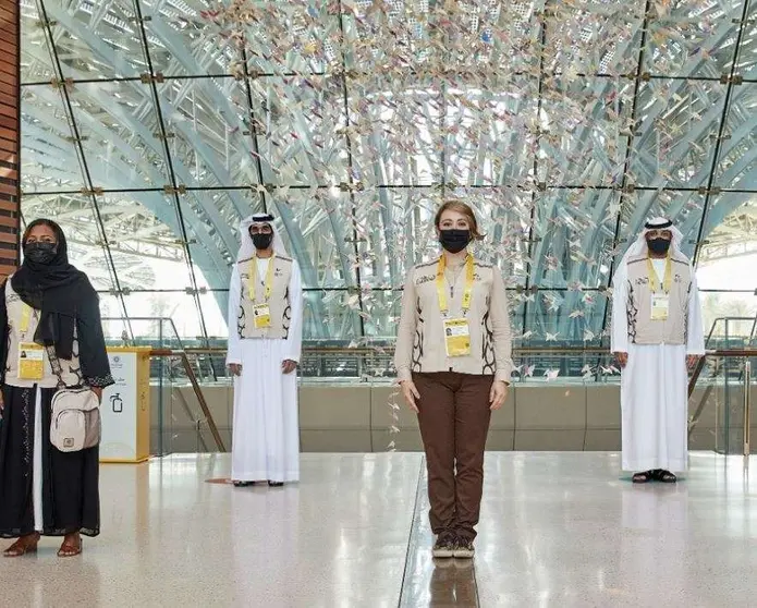 Jóvenes voluntarios emiratíes en la Expo. (Dubai Media Office)