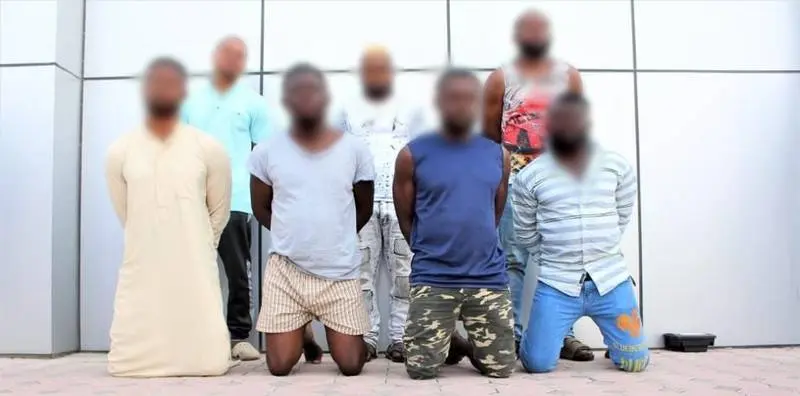 La Policía de Dubai difundió esta imagen de los miembros de las bandas detenidos.