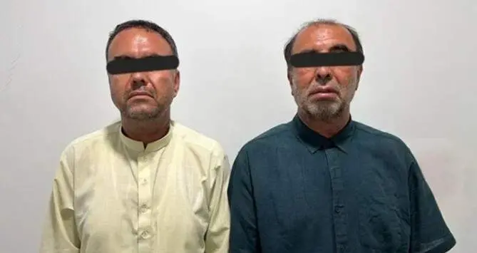 Los dos sospechosos detenidos por la policía. (Fuente externa)