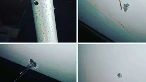 Los impactos de las balas en el barco de pesca de RAK.