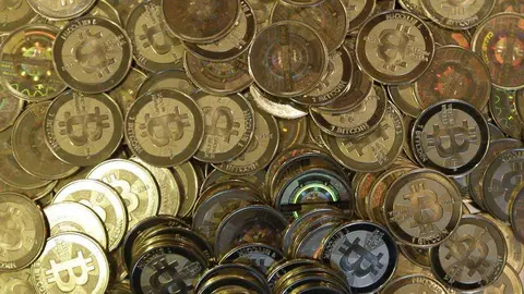 Tokens de bitcoin. (AP)