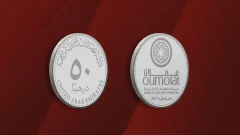 Moneda conmemorativa de la apertura de Oumolat Security Printing.