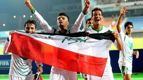 Futbolistas iraquíes.