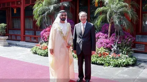 El gobernante de Dubai junto al vicepresidente chino.