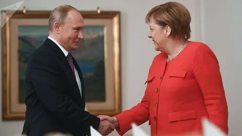 Un encuentro entre la canciller alemana y el presidente de Rusia.