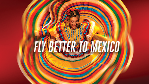 Cartel anunciador de los vuelos de Emirates a México.