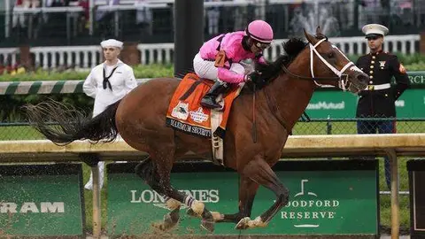 Luis Sáez monta Maximum Security durante una carrera del Derby de Kentucky. (AP)