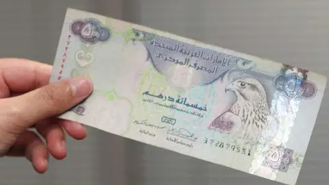 Un billete de curso legal en EAU. (WAM)