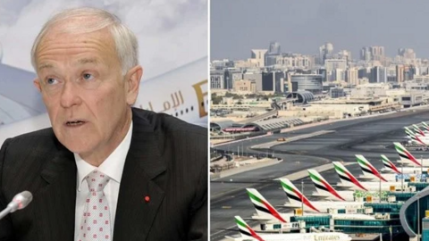 El presidente de Emirates junto a una imagen del Aeropuerto Internacional de Dubai. (AFP)