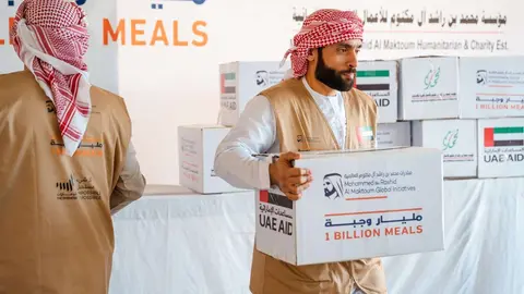 Reparto de alimentos de la campaña '1 billion meals'. (WAM)