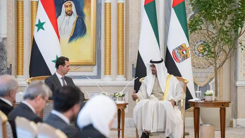Los presidentes de Emiratos y Siria en Abu Dhabi.(WAM)