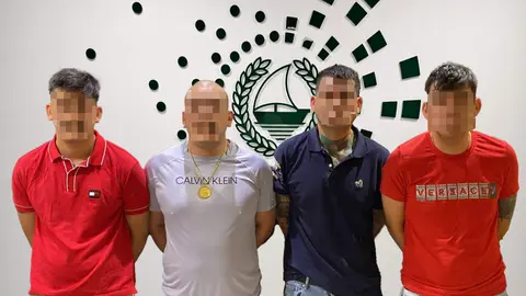 Los cuatro latinos detenidos en Dubai. (Dubai Police)