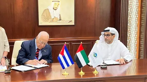 Abdullah Ahmed Al Saleh junto a Ricardo Cabrisas en Abu Dhabi. (Twitter)