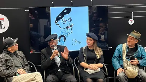 Conversatorio sobre Betto en la Feria del Libro de Bogotá moderado por los periodistas Camila Eslava y Andrés Osorio con la caricatura que Dixon Moya, autor de este texto, ha realizado para El Espectador del prominente ilustrador colombiano recientemente fallecido. (Fuente externa)
