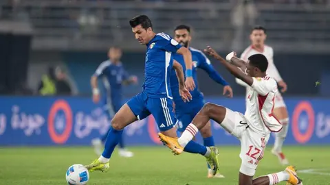 Un momento del partido entre Emiratos Kuwait. (WAM)